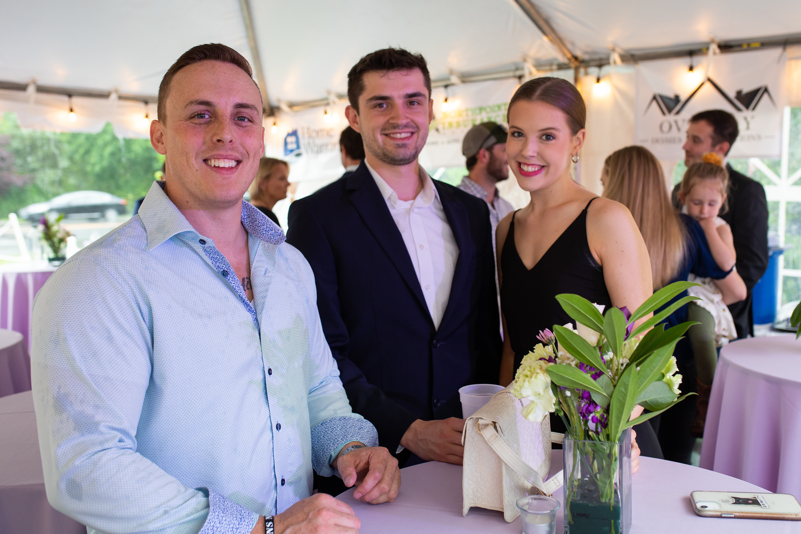 Gravity Real Estate agents networking at event